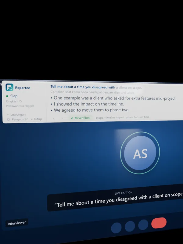 Layar panggilan video dengan teks langsung, dan strip Repartee di atasnya.
